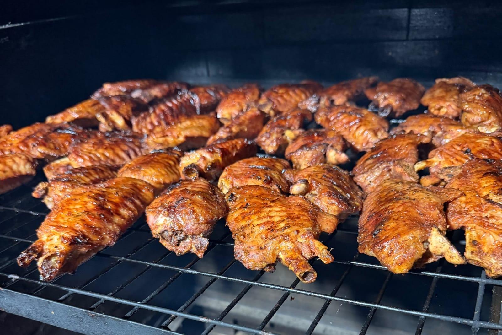 Turkey wings being smoked low n slow style in the smoker